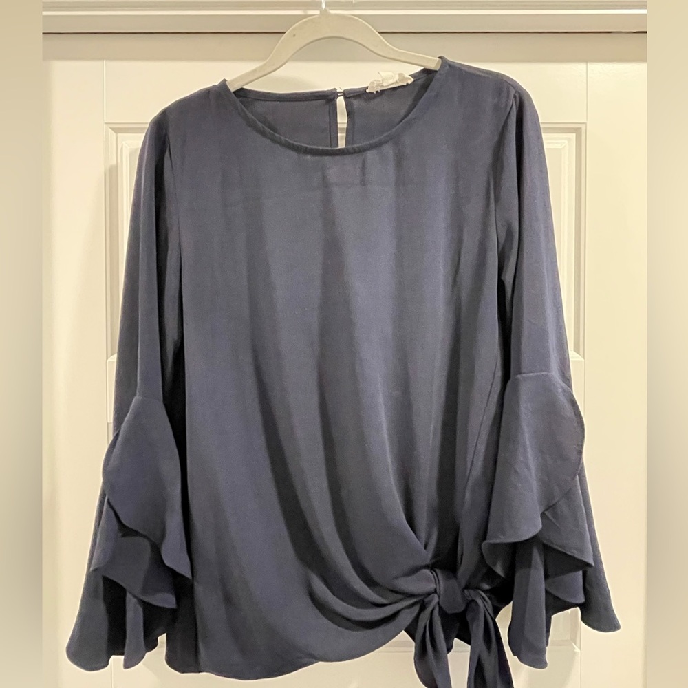 Navy ruffle sleeve blouse with front tie